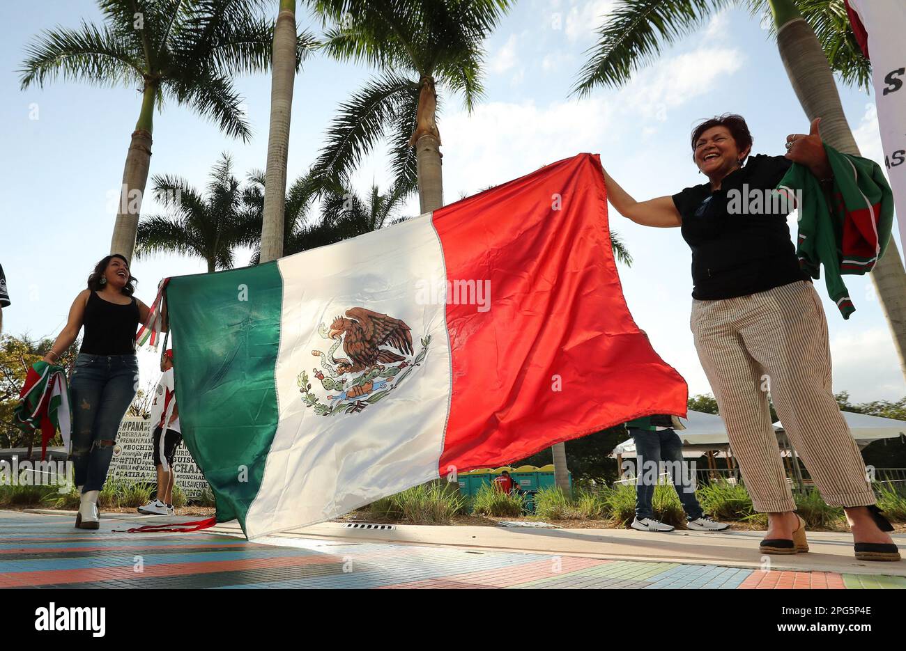 Miami, United States. 20th Mar, 2023. Team Mexico baseball fans show off the Mexico National Flag prior to the 2023 World Baseball Classic semifinal game between Japan and Mexico in Miami, Florida on Monday, March 20, 2023. Photo by Aaron Josefczyk/UPI Credit: UPI/Alamy Live News Stock Photo