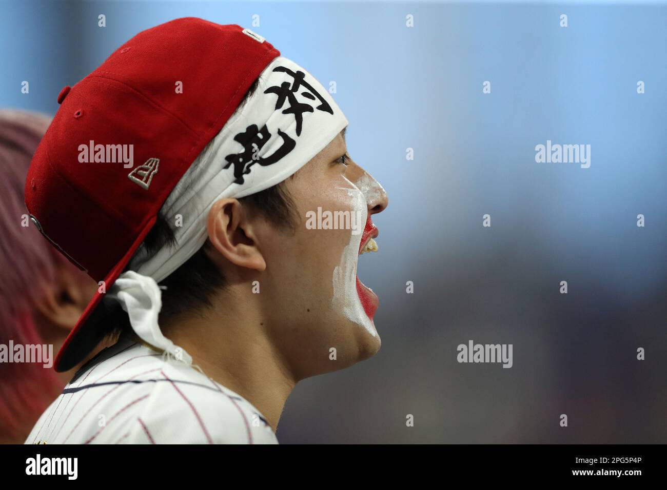 Miami, United States. 20th Mar, 2023. A Japanese baseball fan cheers during the first inning of the 2023 World Baseball Classic semifinal game against Mexico in Miami, Florida on Monday, March 20, 2023. Photo by Aaron Josefczyk/UPI Credit: UPI/Alamy Live News Stock Photo