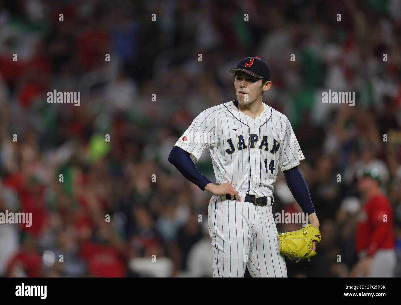 Luis Urias of Mexico hits three-run homer in the 4th inning during the  World Baseball Classic (WBC) semifinal match between Mexico and Japan at  LoanDepot Park in Miami, Florida, United States on