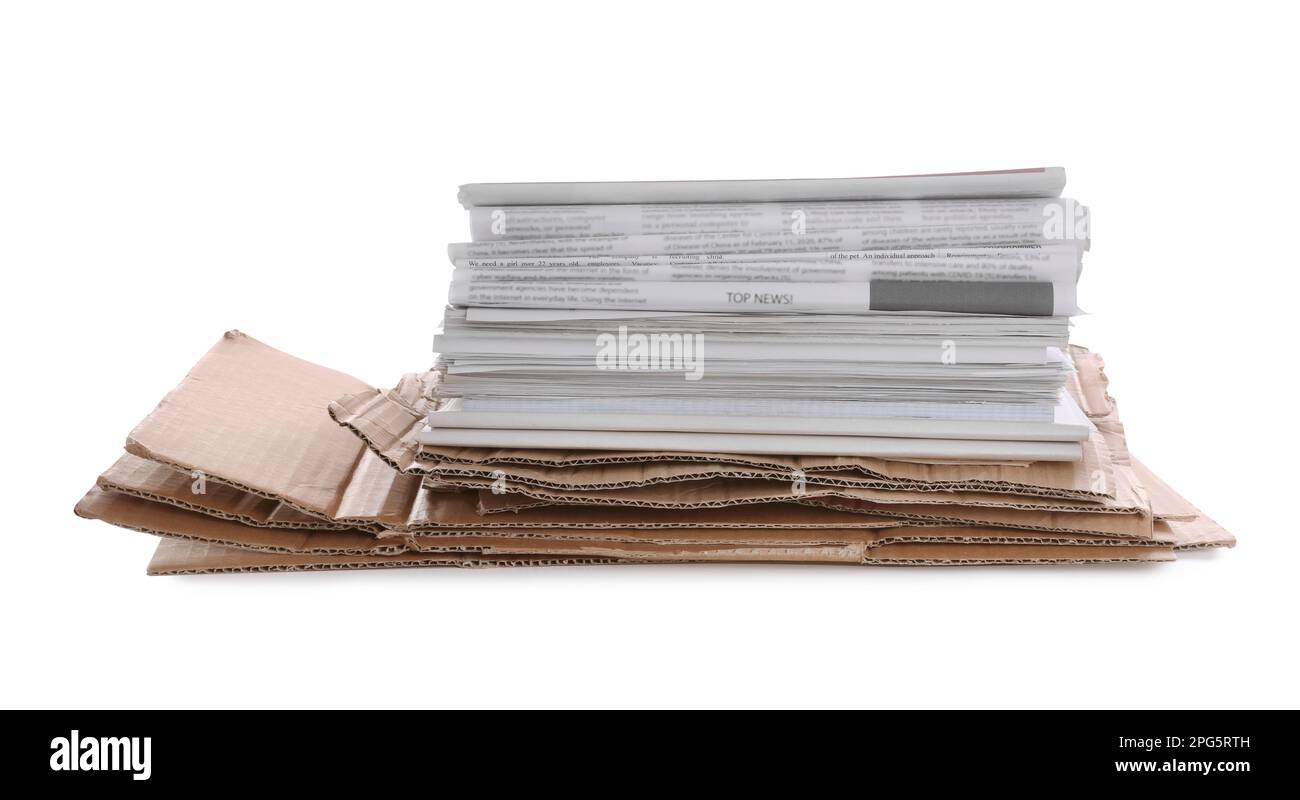 Stack of cardboard and newspapers on white background. Recycling