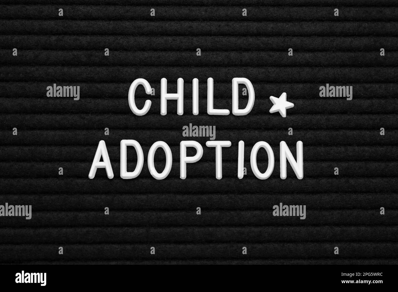 Phrase Child Adoption on black letter board, flat lay Stock Photo - Alamy