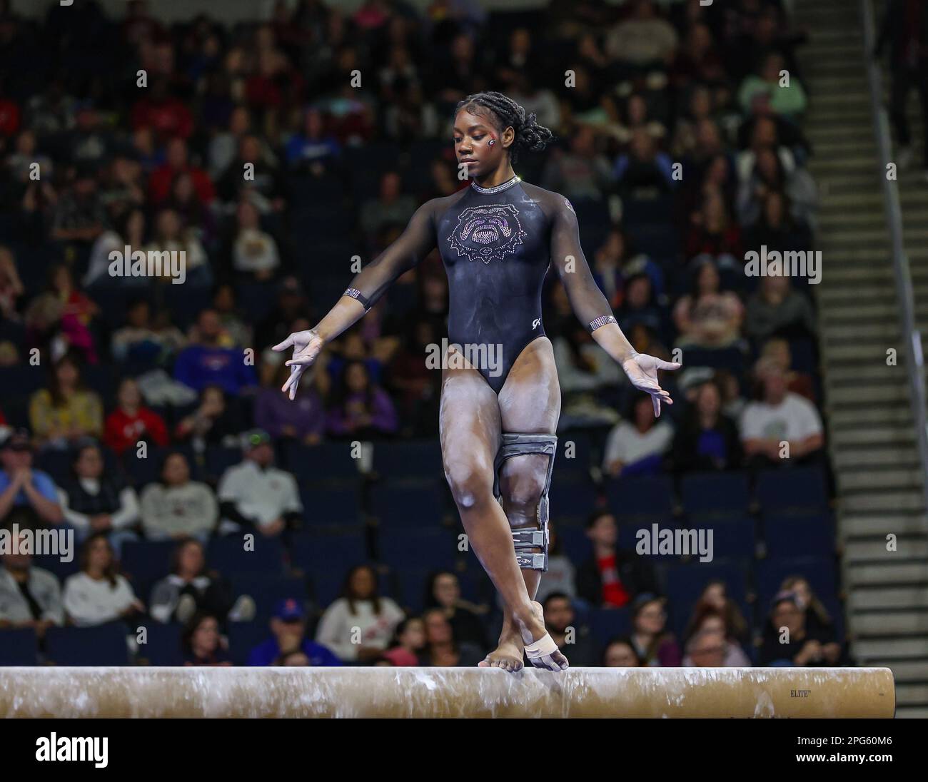 March 18, 2023 JaFree Scott competes on the balance beam