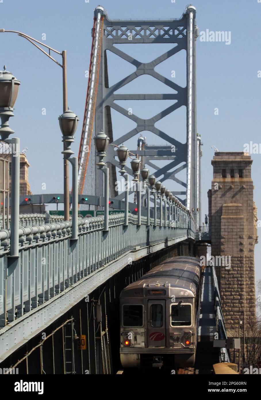A westbound PATCO Speedline train traverses the Ben Franklin Bridge between Philadelphia and New Jersey. Stock Photo