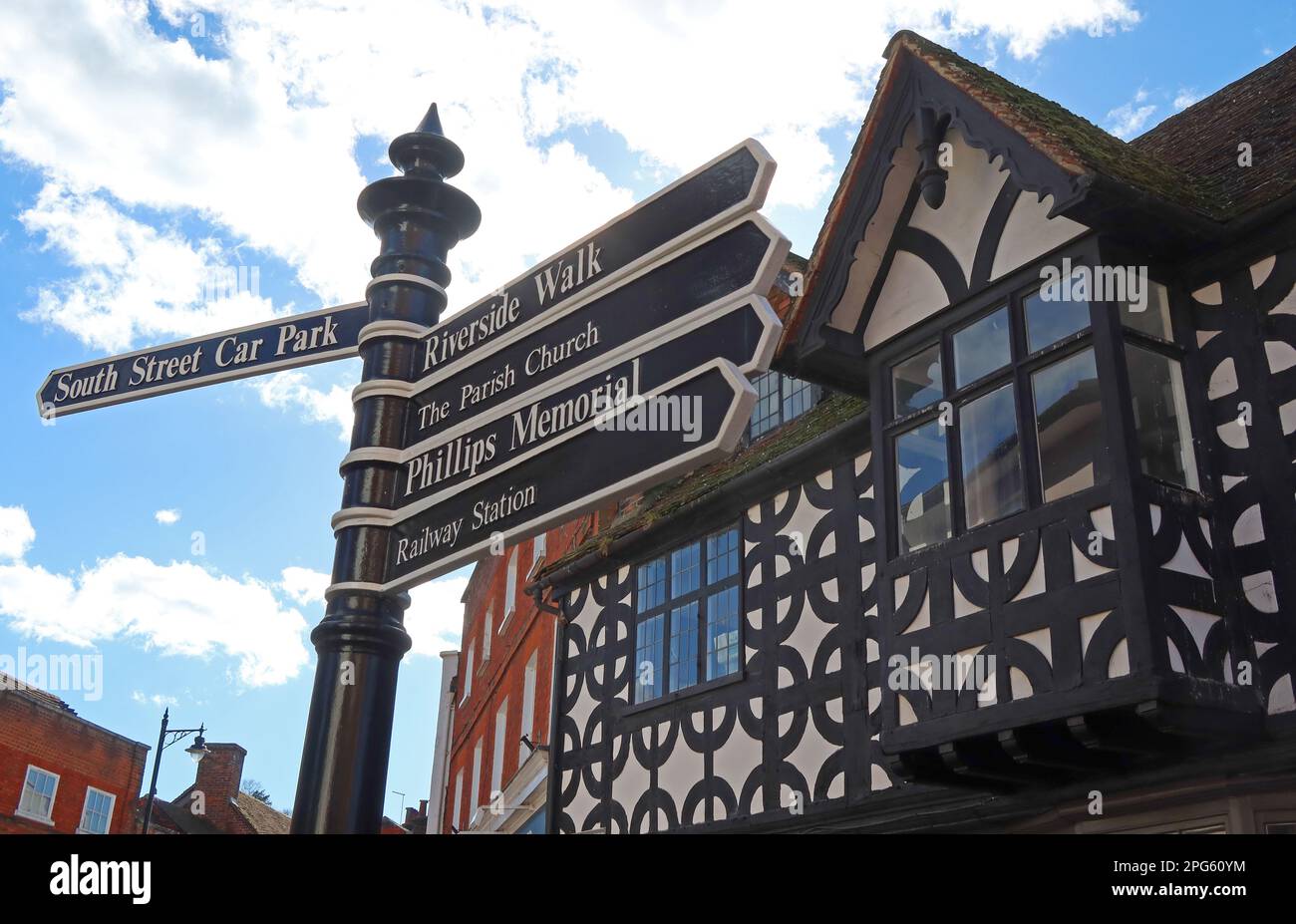 Signposts in Church Street & High Street, Godalming town, Waverley, Surrey, England, UK, GU7 1AB Stock Photo