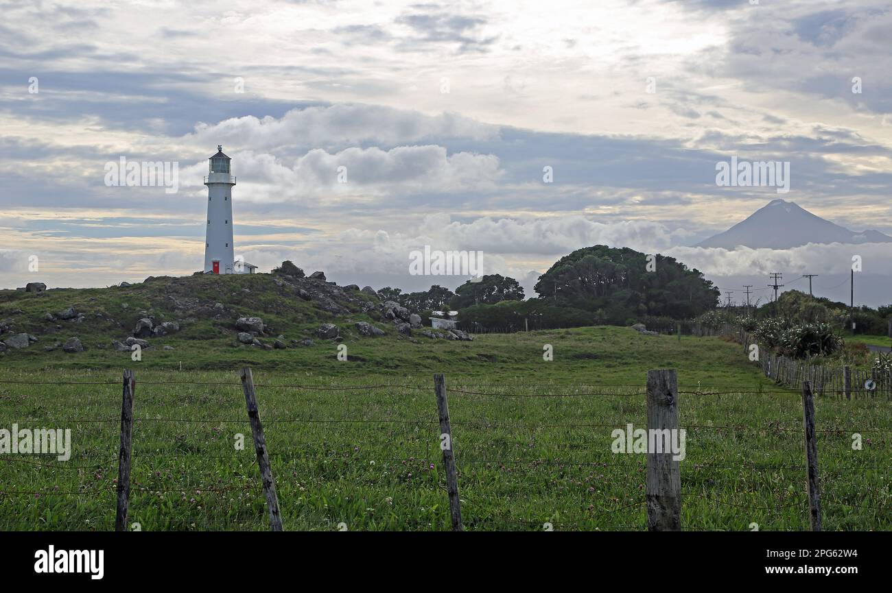 Cape Egmont lighthouse and Taranaki - New Zealand Stock Photo