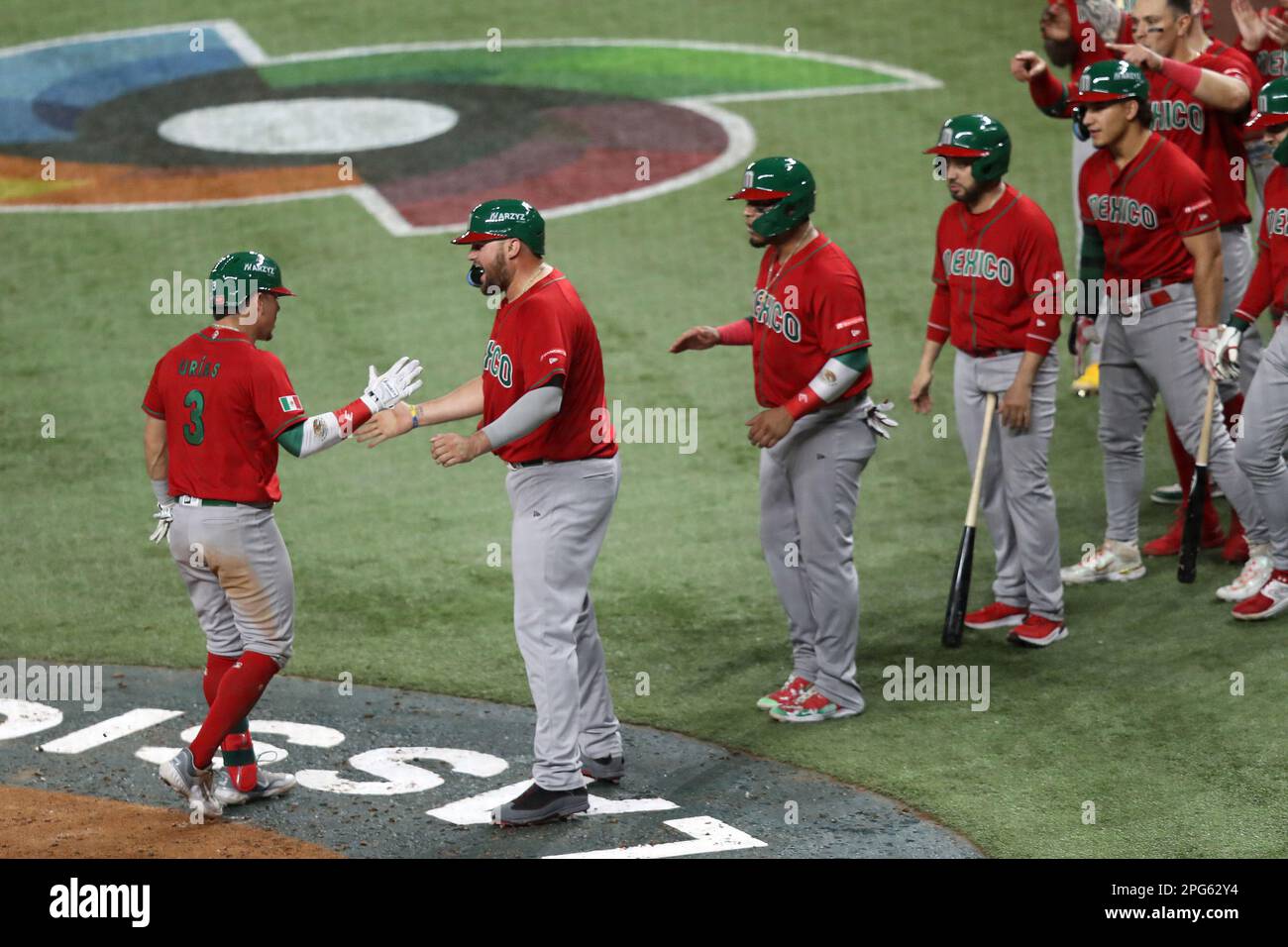 Miami, United States. 20th Mar, 2023. Mexico Luis Urias (3) celebrates with teammate Ryan Tellez (11) after hitting a three run home run in the third inning of the 2023 World Baseball Classic semifinal game against Japan in Miami, Florida on Monday, March 20, 2023. Photo by Aaron Josefczyk/UPI Credit: UPI/Alamy Live News Stock Photo