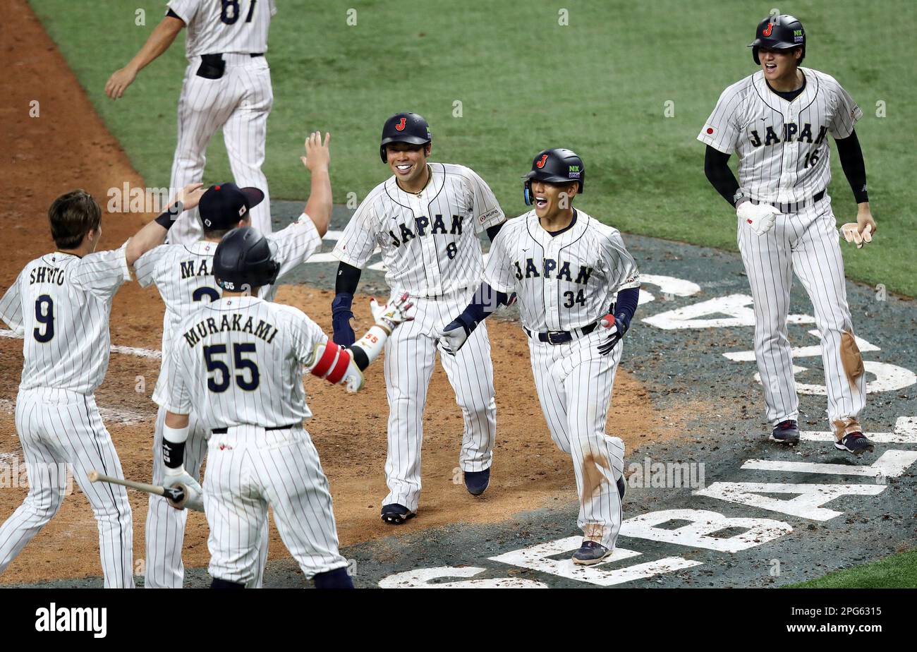 Miami, United States. 20th Mar, 2023. Japan's Masataka Yoshinda (34) celebrates with teammates after hitting a three run home run in the seventh inning of the 2023 World Baseball Classic semifinal game against Mexico in Miami, Florida on Monday, March 20, 2023. Photo by Aaron Josefczyk/UPI Credit: UPI/Alamy Live News Stock Photo
