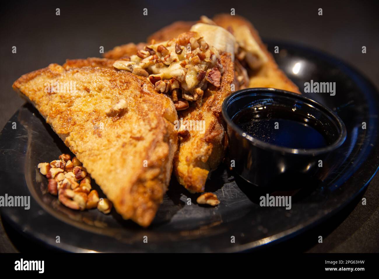 Banana Foster French Toast with Maple syrup Stock Photo Alamy
