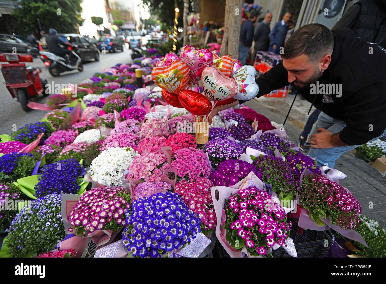Beirut, Lebanon. 20th Mar, 2023. A flower seller prepares for Mother's Day  in Beirut, Lebanon, March
