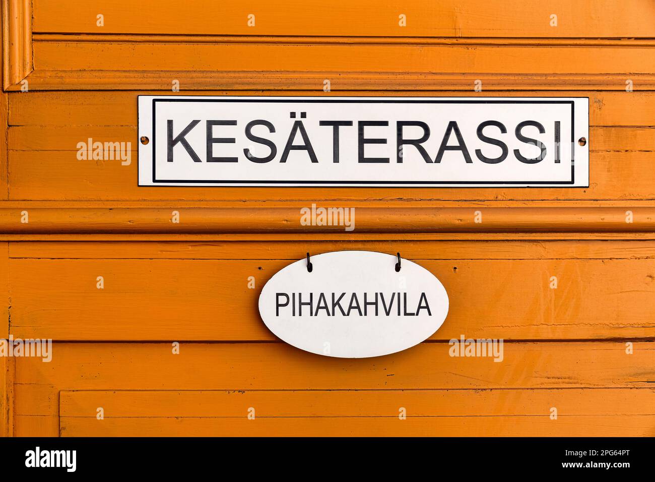 Signs on an old wooden door, inscription Summer Terrace, Cafe Terrace, Finnish, Old Town of Rauma, UNESCO World Heritage Site, Satakunta, Finland Stock Photo