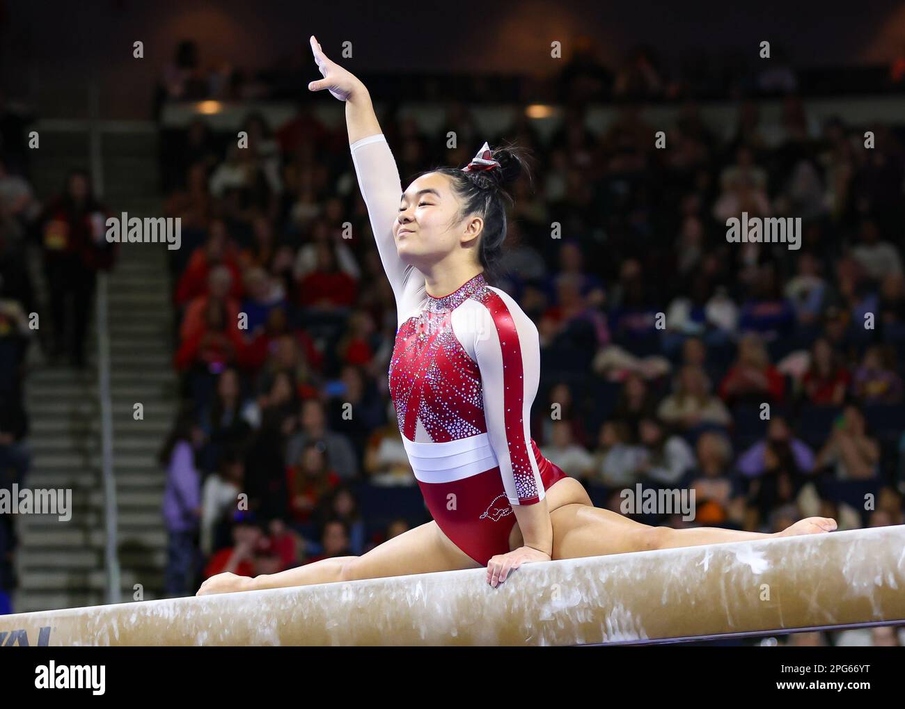 March 18, 2023 Arkansas' Kalyxta Gamiao begins her beam routine during