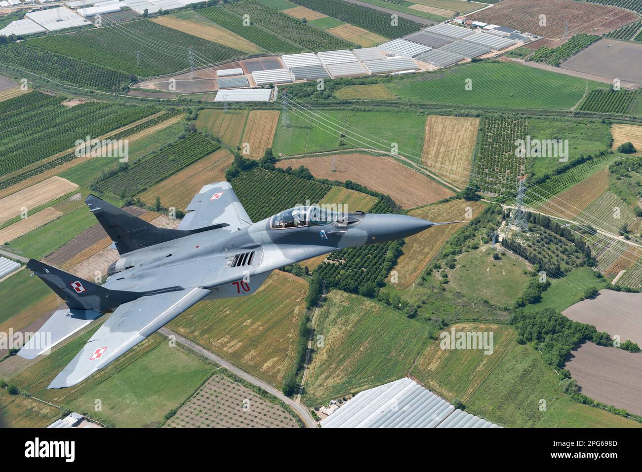 Polish Air Force Mig-29 Fighter Jet flying Above Turkey Countryside During Air-To-Air Flight Stock Photo
