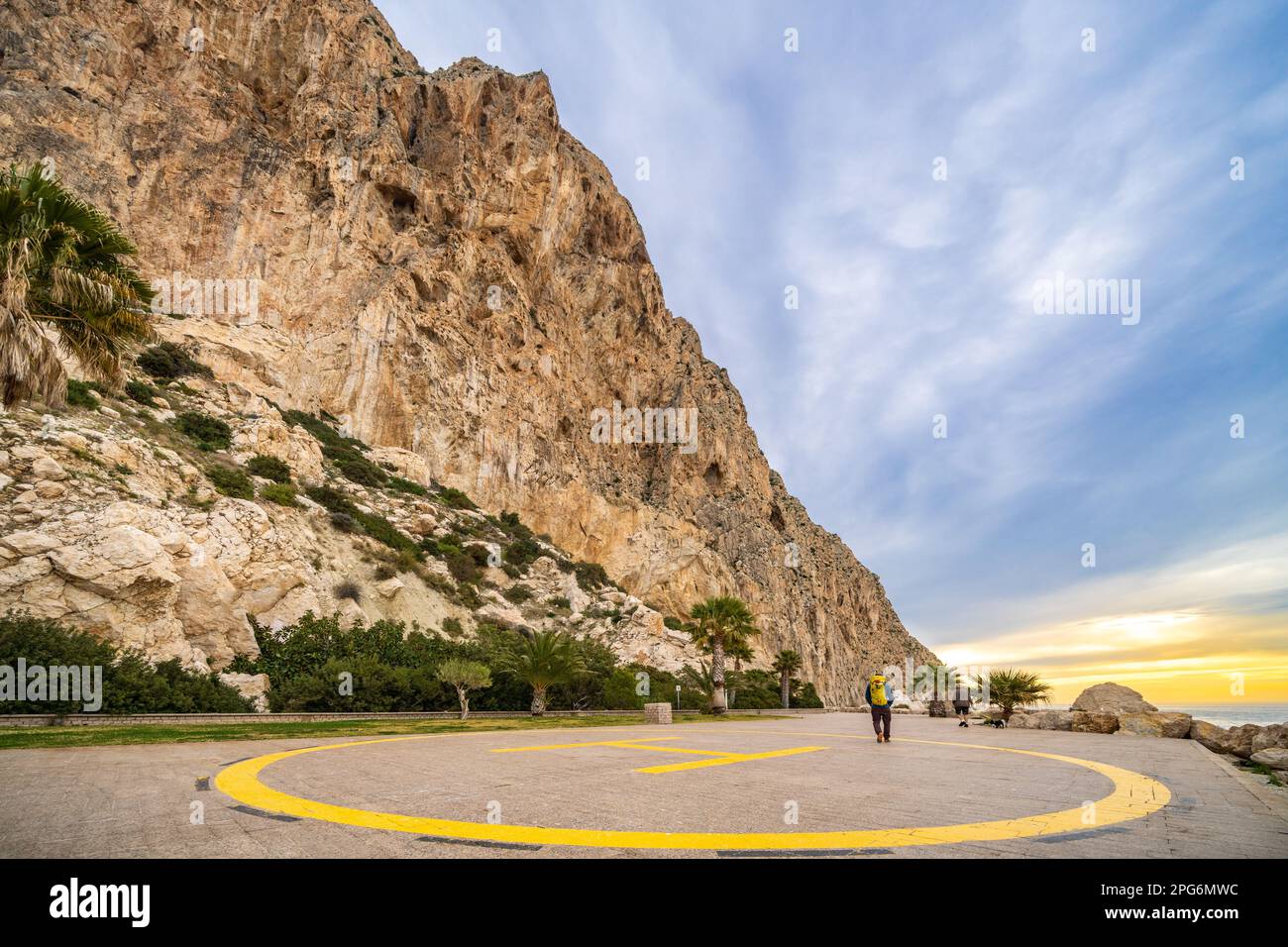 On the way to trad rock climbing in Penyal d'Ifac National Park at Calp