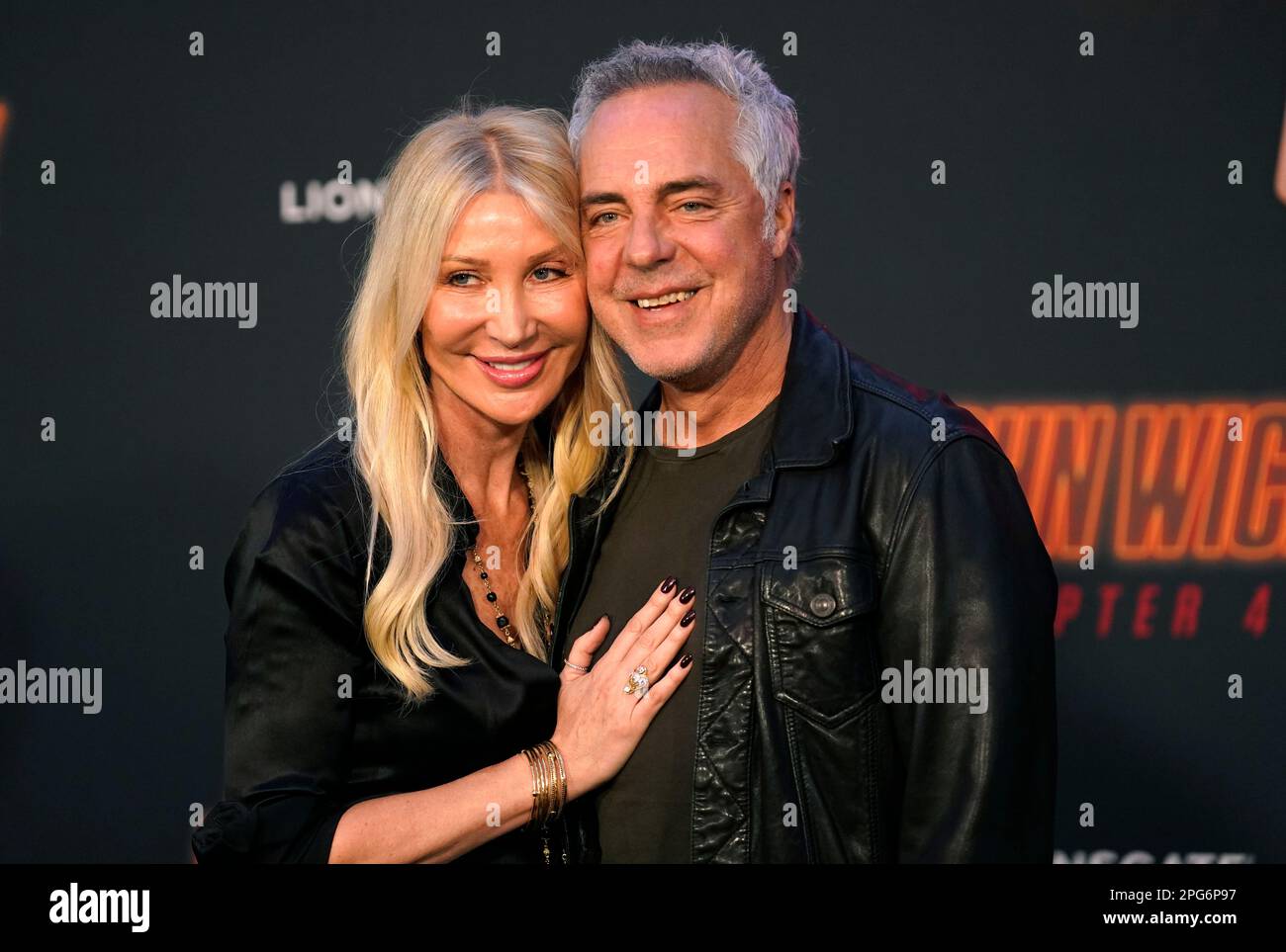 Titus Welliver and his wife Jose Stemkens pose together at the premiere