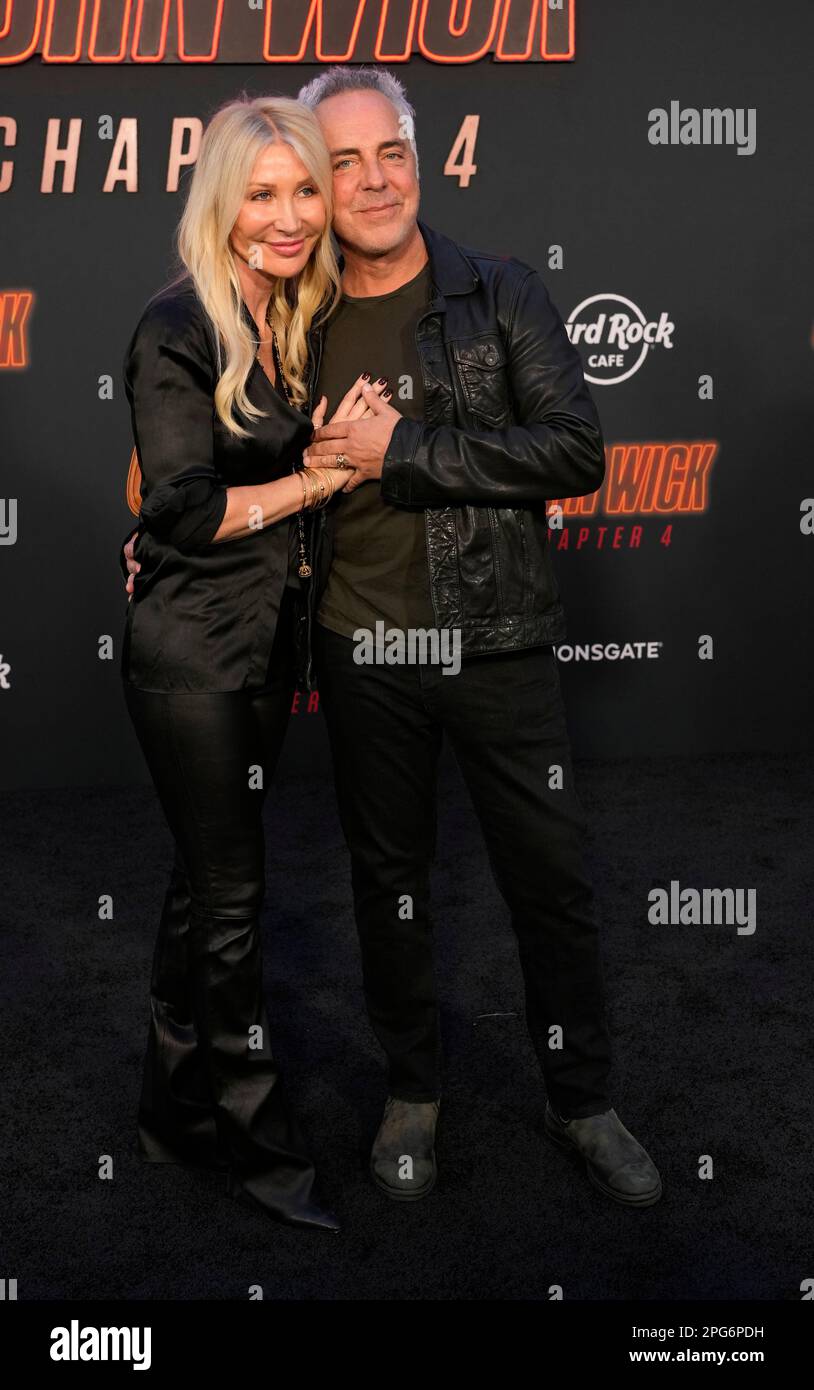 Titus Welliver and his wife Jose Stemkens pose together at the premiere