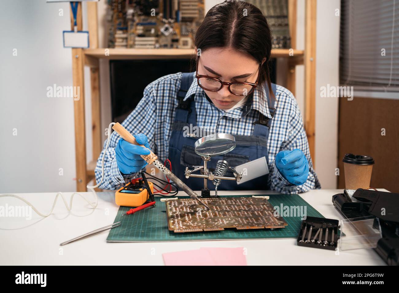 Fixing Digital Fixing digital electronic hi-res stock photography and images - Alamy