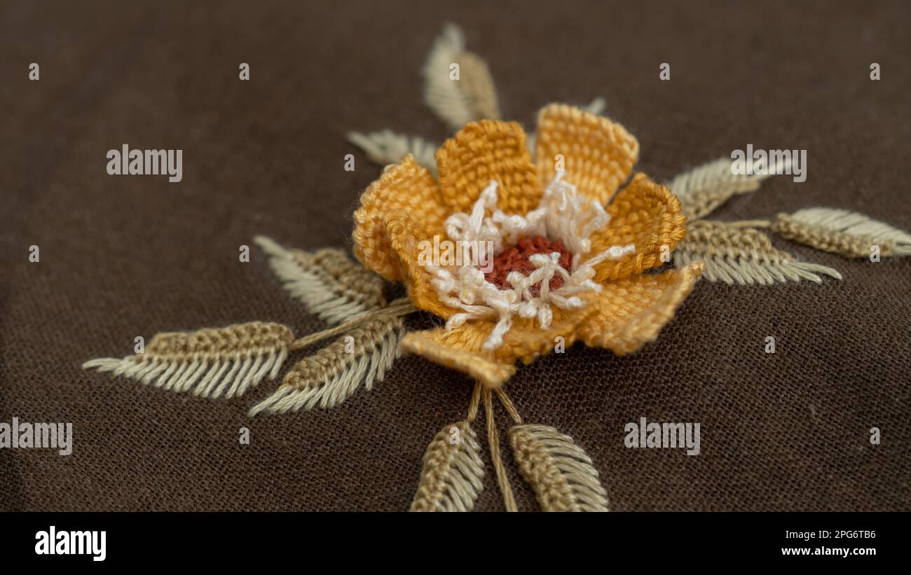 Hand embroidery flower hi-res stock photography and images - Alamy