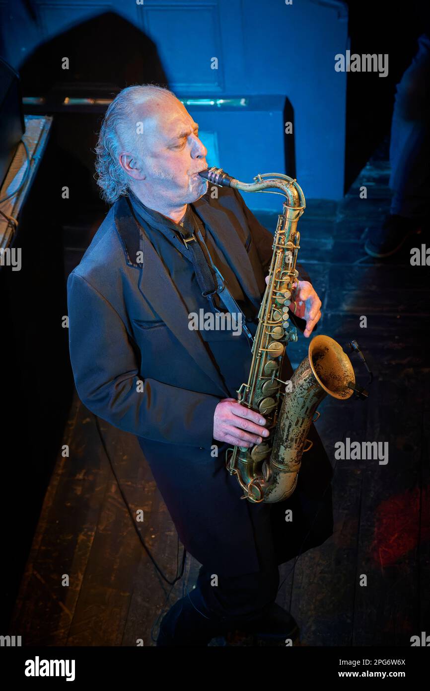 Saxophonist Dave Lewis performing with The Blockheads at The Acapela Studios, Pentyrch, March 2023 Stock Photo