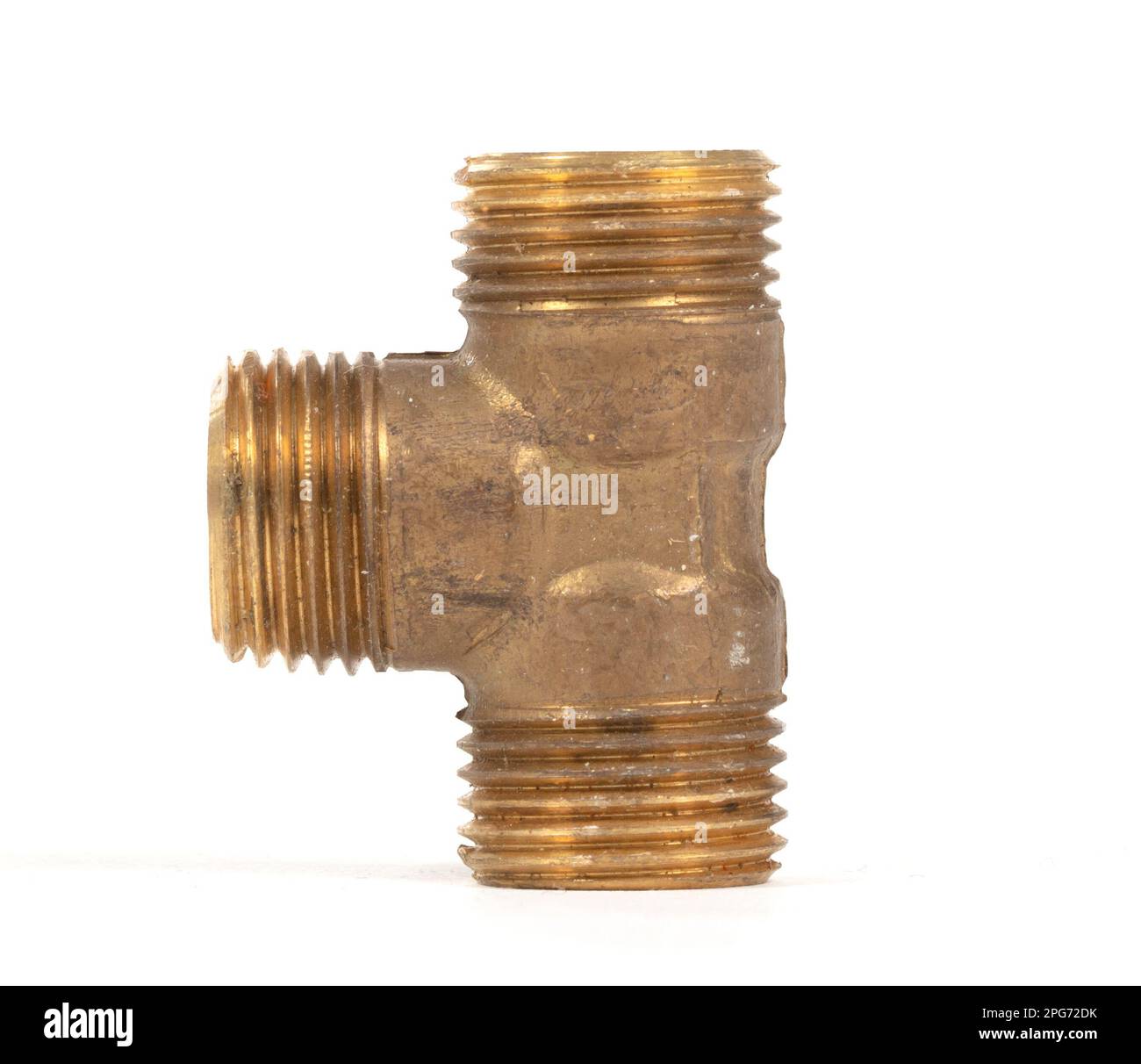 Brass fitting for plumbing pipes, T adapter, isolated on white Stock