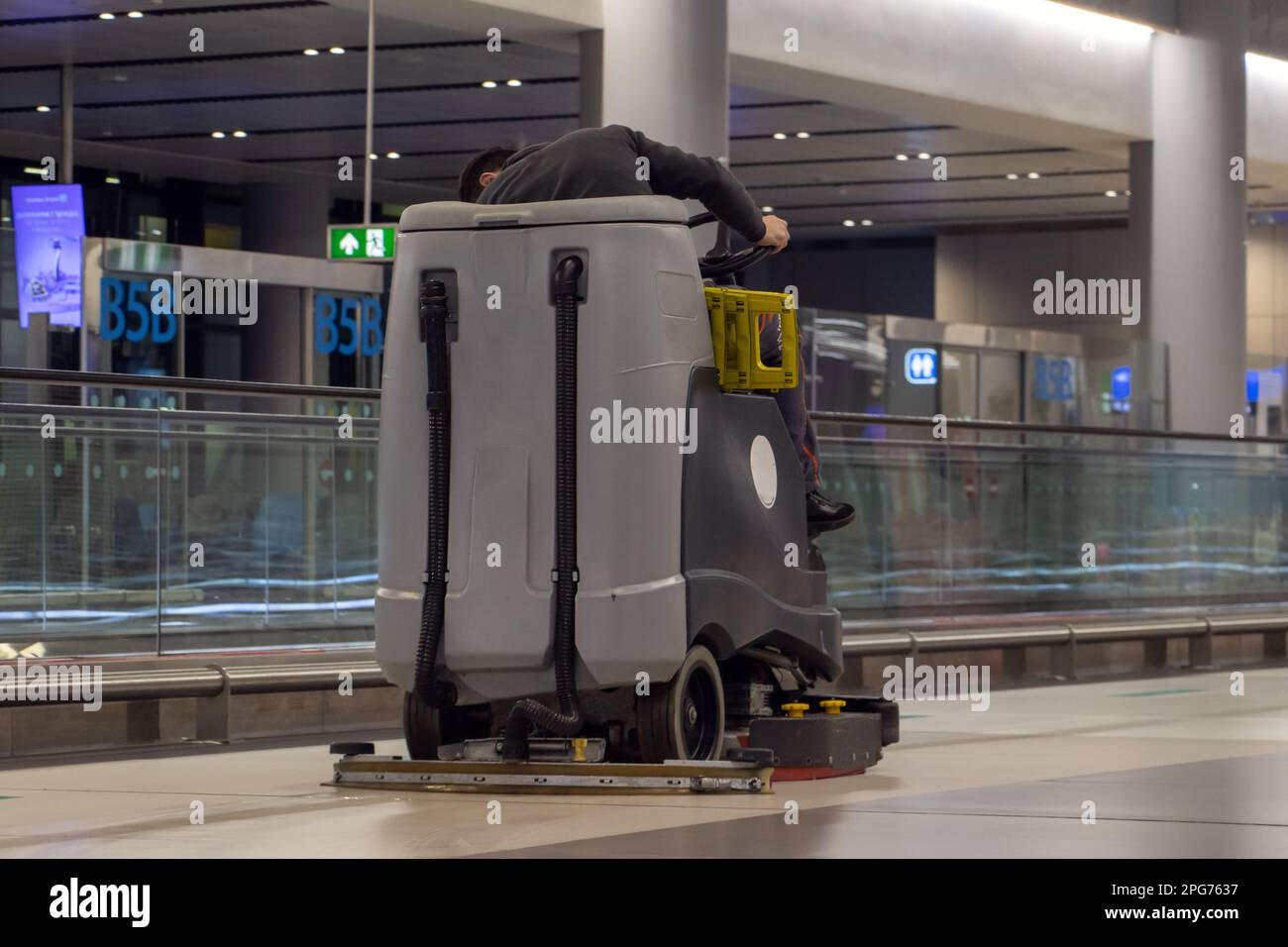 Night cleaning with the help of mechanization in the hall Stock Photo