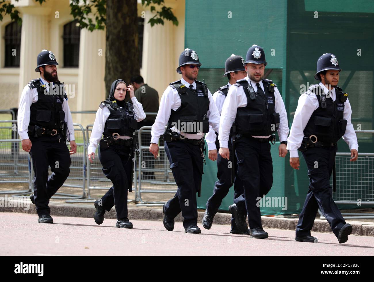 Pic shows: Police including a female muslim police officer guarding the ...