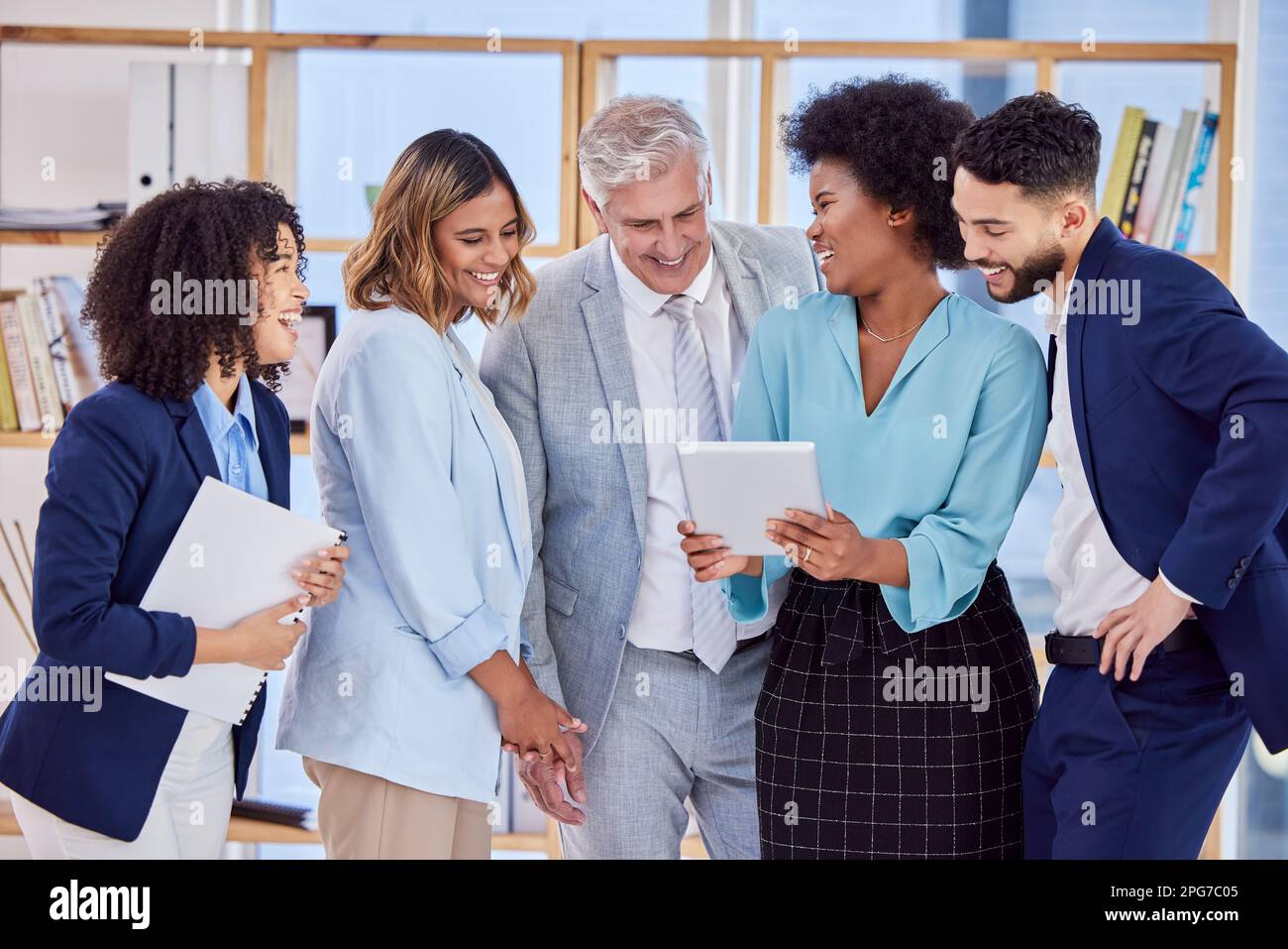 Business people, tablet and laughing in team meeting for funny meme, joke or social media post