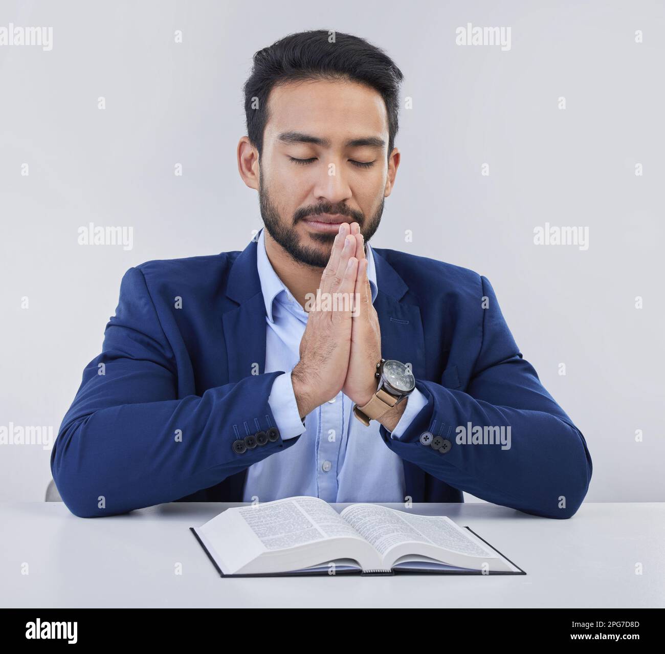 Mockup, faith and Asian man, praying, bible and guidance against grey