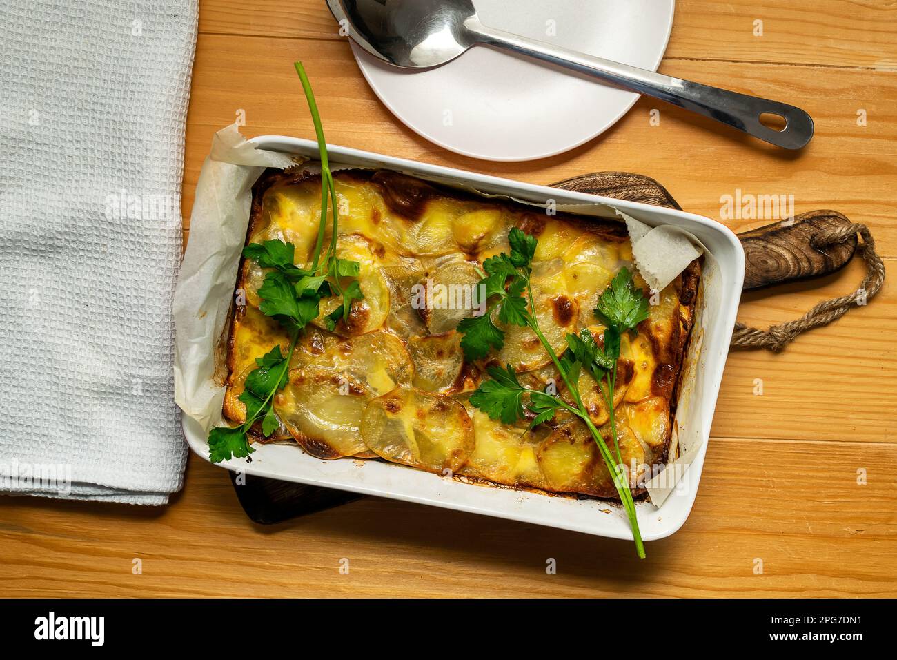 Traditional Greek potato and meat casserole with cheese moussaka