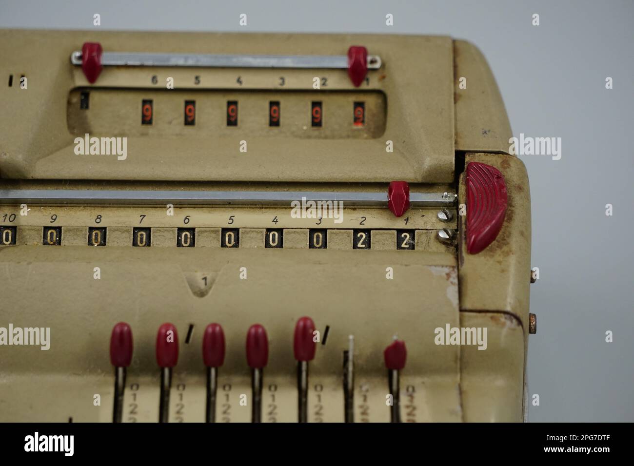 An antique mechanical calculator for counting funds Stock Photo - Alamy