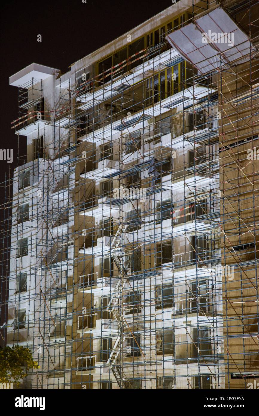 Nigh time view of a new highrise apartment building during construction in the Rosebank CBD
