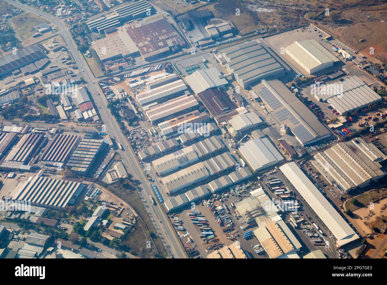 Aerial view of an industrial area with warehousing and factories near