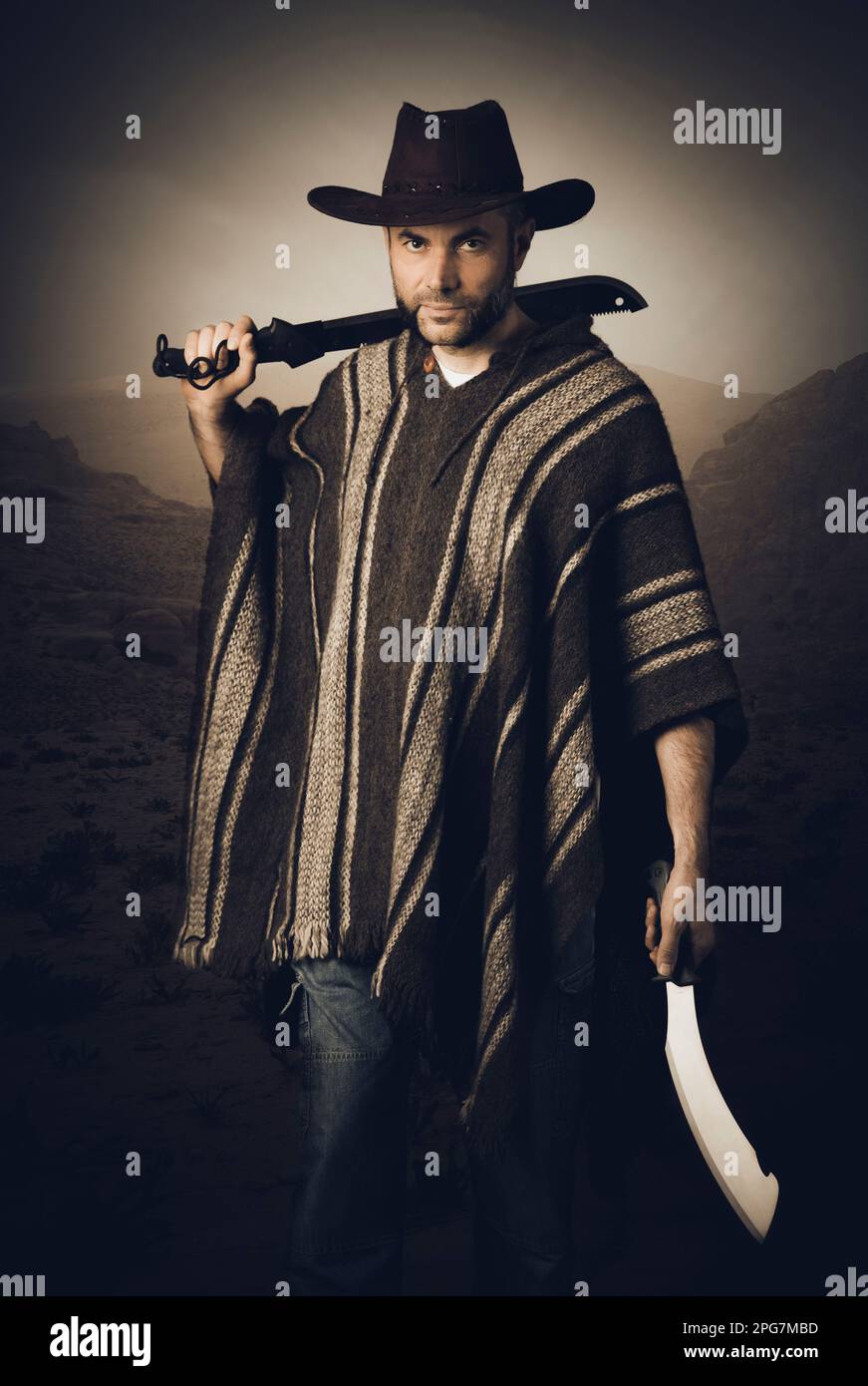 portrait of man with leather hat and machete in hands Stock Photo