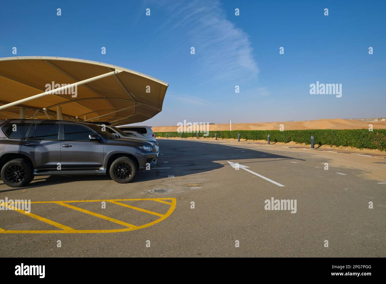 The parking lot with shade awning, overhang, heat protection for cars