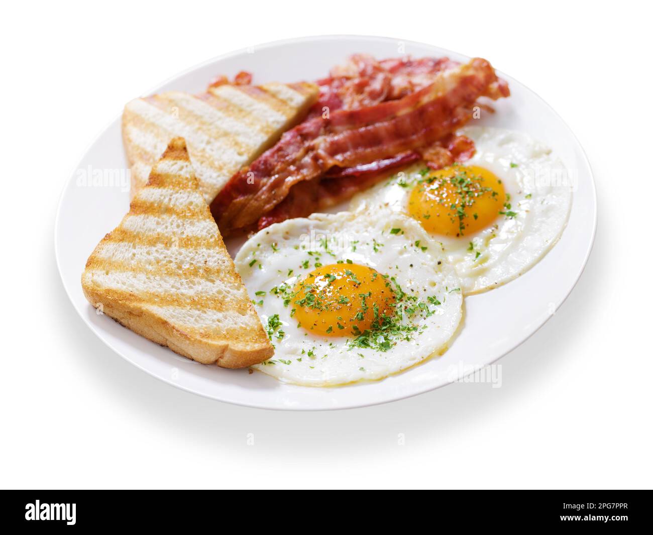 plate of fried eggs, bacon and toast isolated on white background Stock ...