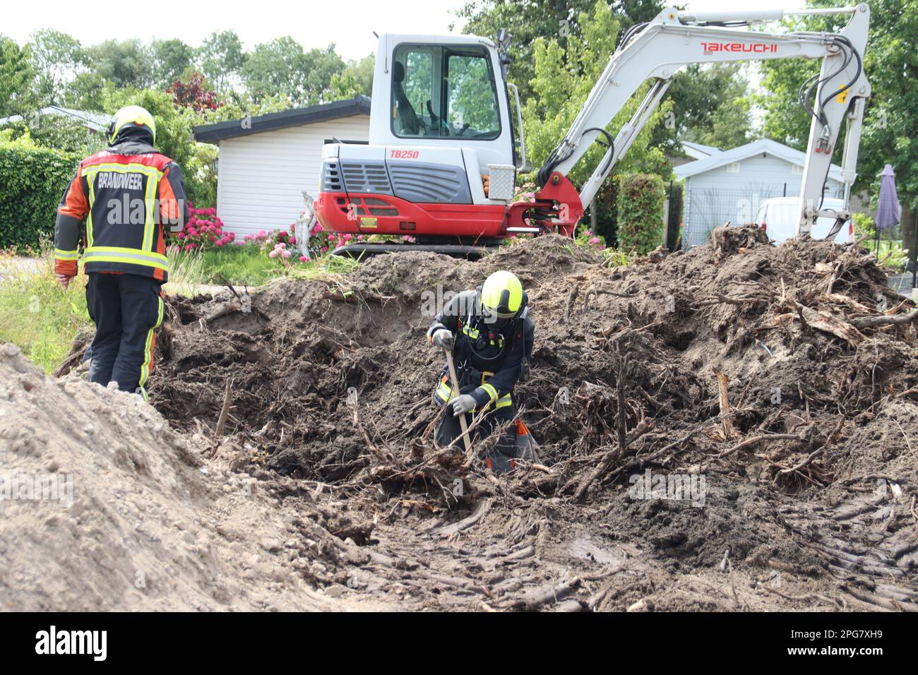 Firefighters must take action if a gas pipe is hit during excavation work at Park de IJsselhoeve in Nieuwerkerk aan den IJssel the Netherlands Stock Photo