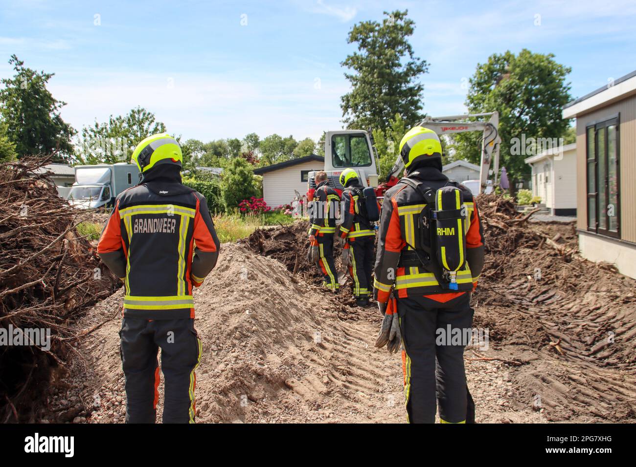 Firefighters must take action if a gas pipe is hit during excavation work at Park de IJsselhoeve in Nieuwerkerk aan den IJssel the Netherlands Stock Photo