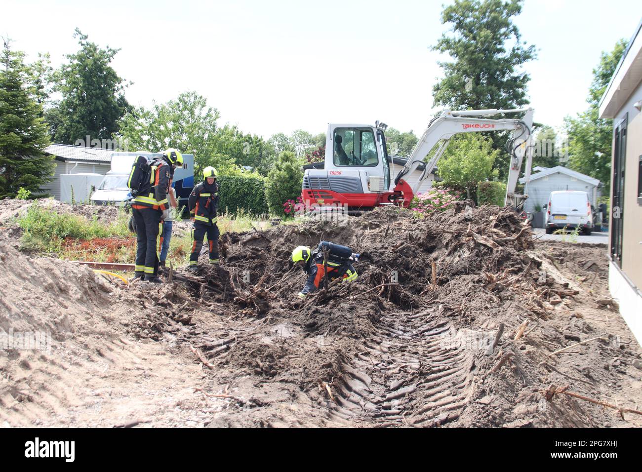 Firefighters must take action if a gas pipe is hit during excavation work at Park de IJsselhoeve in Nieuwerkerk aan den IJssel the Netherlands Stock Photo