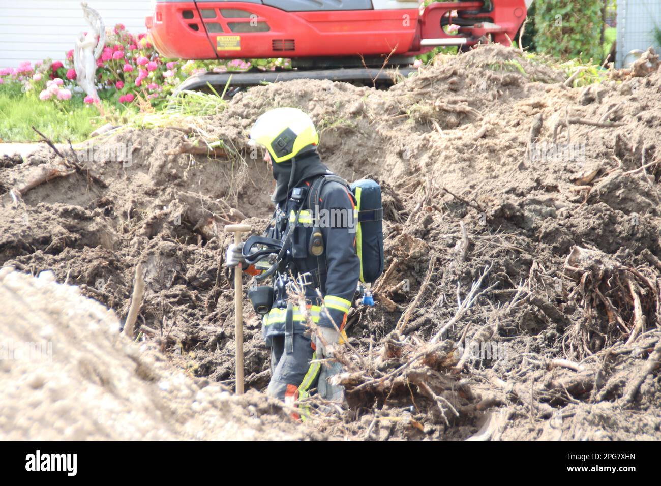 Firefighters must take action if a gas pipe is hit during excavation work at Park de IJsselhoeve in Nieuwerkerk aan den IJssel the Netherlands Stock Photo