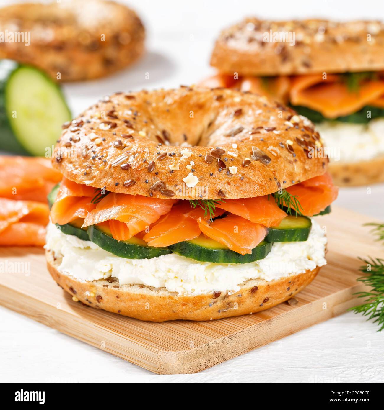 Stuttgart, Germany - March 15, 2023: Bagel Roll Sandwich For Breakfast Topped With Salmon Fish Square In Stuttgart, Germany. Stock Photo