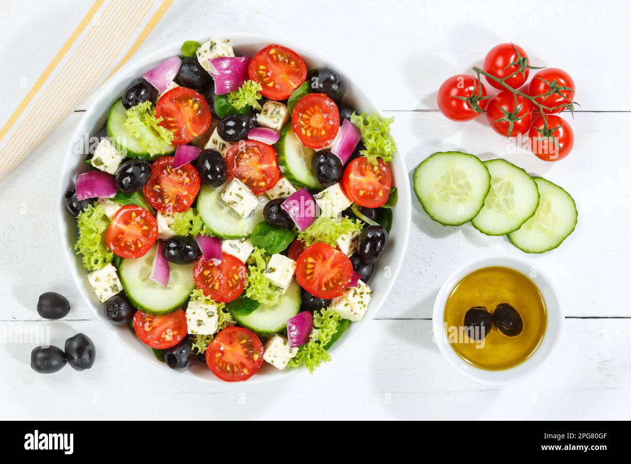 Stuttgart, Germany - December 27, 2022: Greek Salad With Fresh Tomatoes Olives And Feta Cheese Healthy Food Eating From Top On Wooden Board In Stuttga Stock Photo