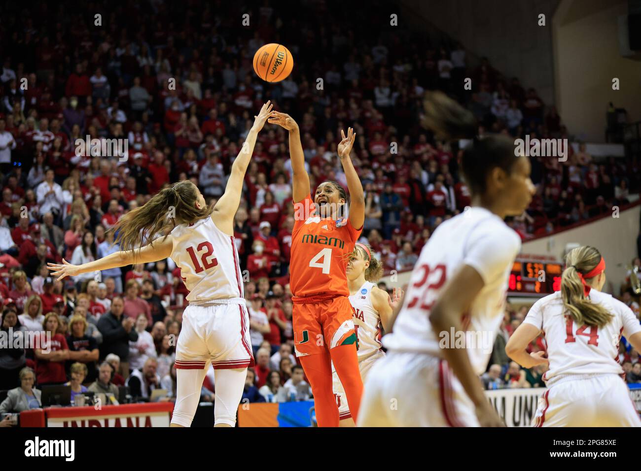 Bloomington, United States. 21st Mar, 2023. Miami Hurricanes guard Jasmyne Roberts (4) plays against Indiana Hoosiers guard Yarden Garzon (12) during the second round NCAA womenís basketball tournament game at Simon Skjodt Assembly Hall. The Hoosiers lost to the Hurricanes 70-68. (Photo by Jeremy Hogan/SOPA Images/Sipa USA) Credit: Sipa USA/Alamy Live News Stock Photo
