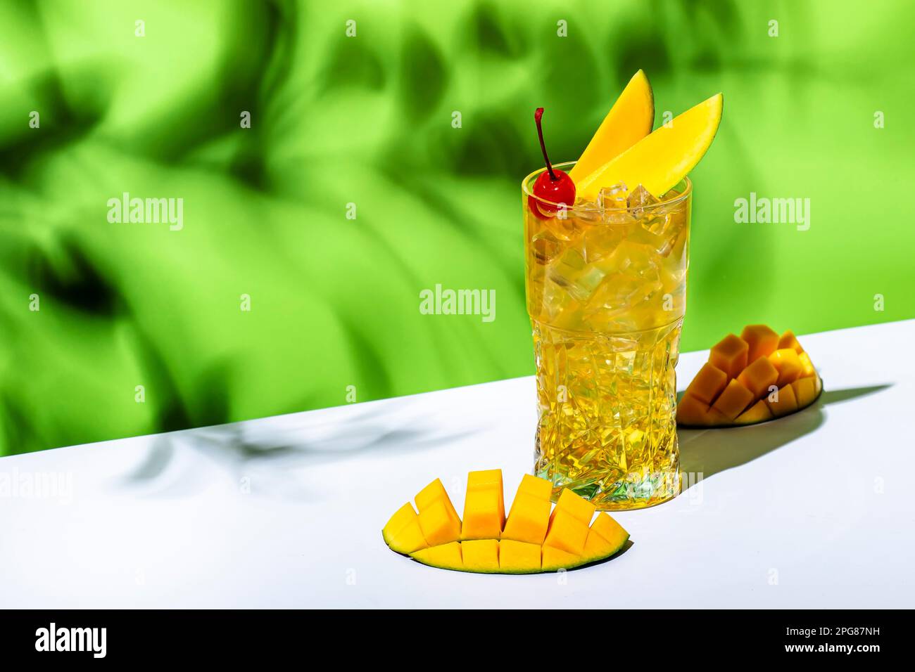 Mango rum collins alcoholic cocktail drink with white rum, syrup