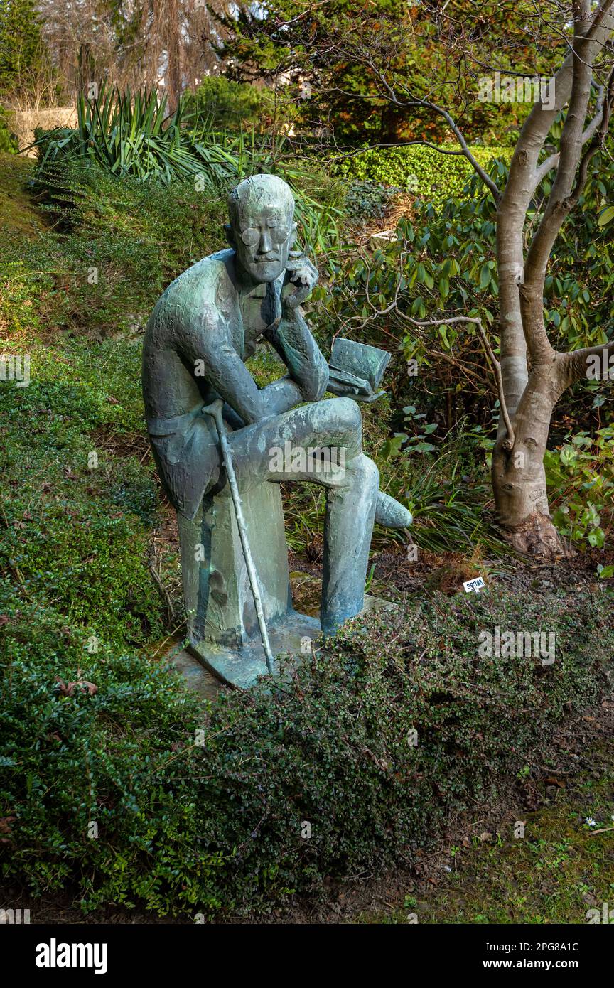 Zurich, Switzerland - February 22, 2023: Statue of famous Irish novelist, writer and poet James Joyce at the grave in Zurich Stock Photo