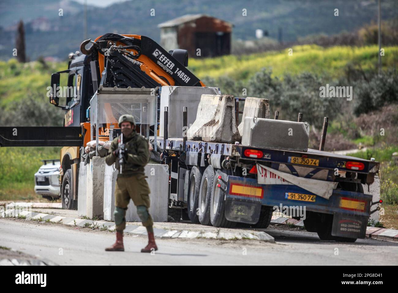 Israeli army forces set up a new military checkpoint in the town of Hawara, south of Nablus, in the occupied West Bank. (Photo by Nasser Ishtayeh / SOPA Images/Sipa USA) Stock Photo