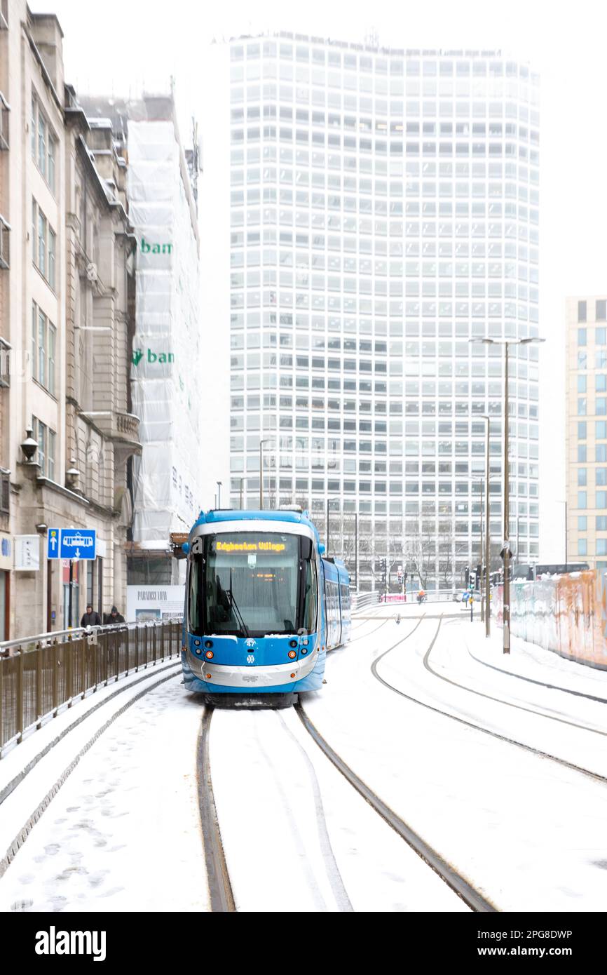BIRMINGHAM, UK - MARCH 9, 2023.  West Midlands Tram in Birmingham city centre during travel disruption caused by heavy snow Stock Photo