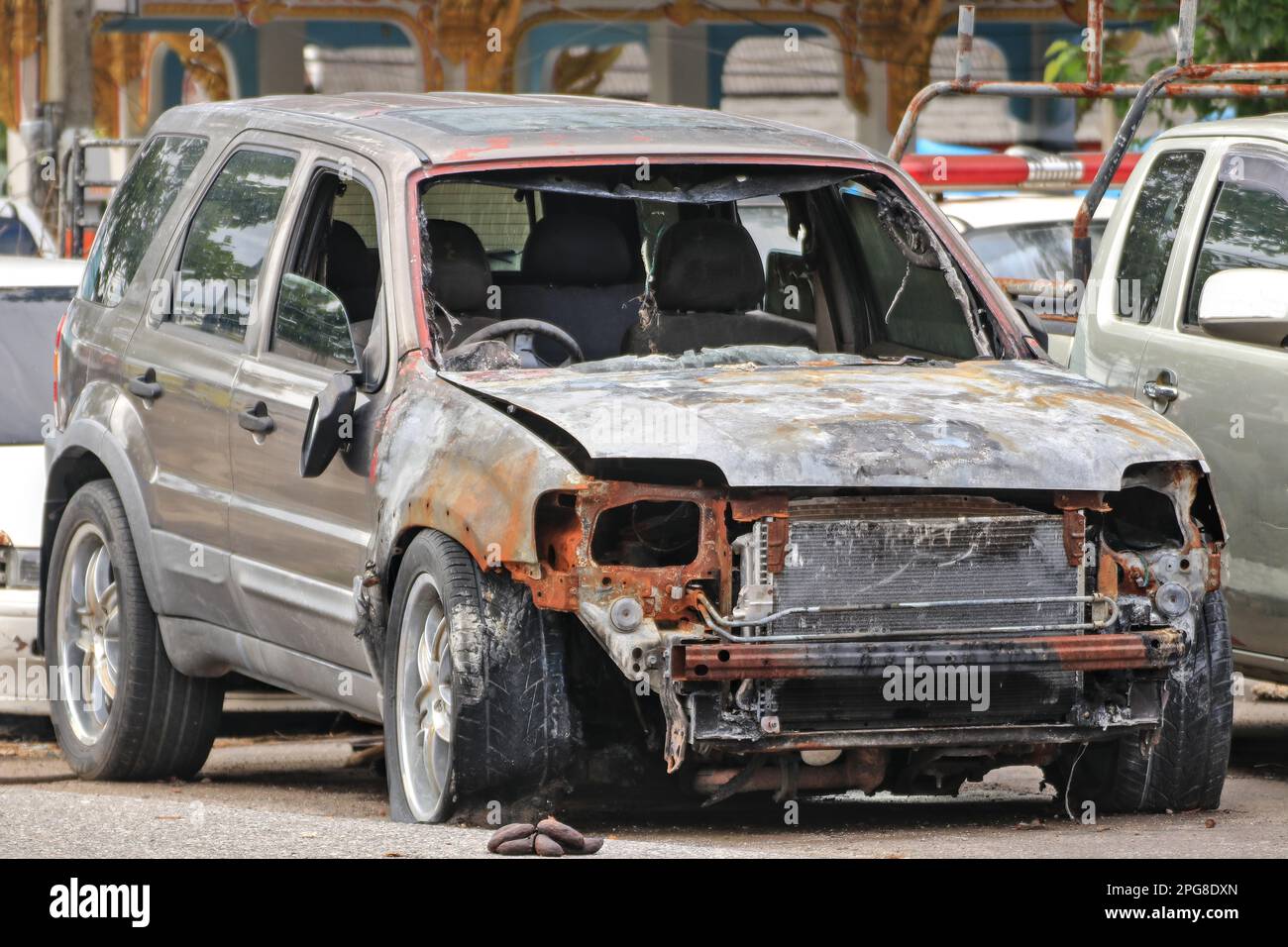 The accident car was parked outdoors for repairs. until the parts rust Internal parts are corroded. Stock Photo