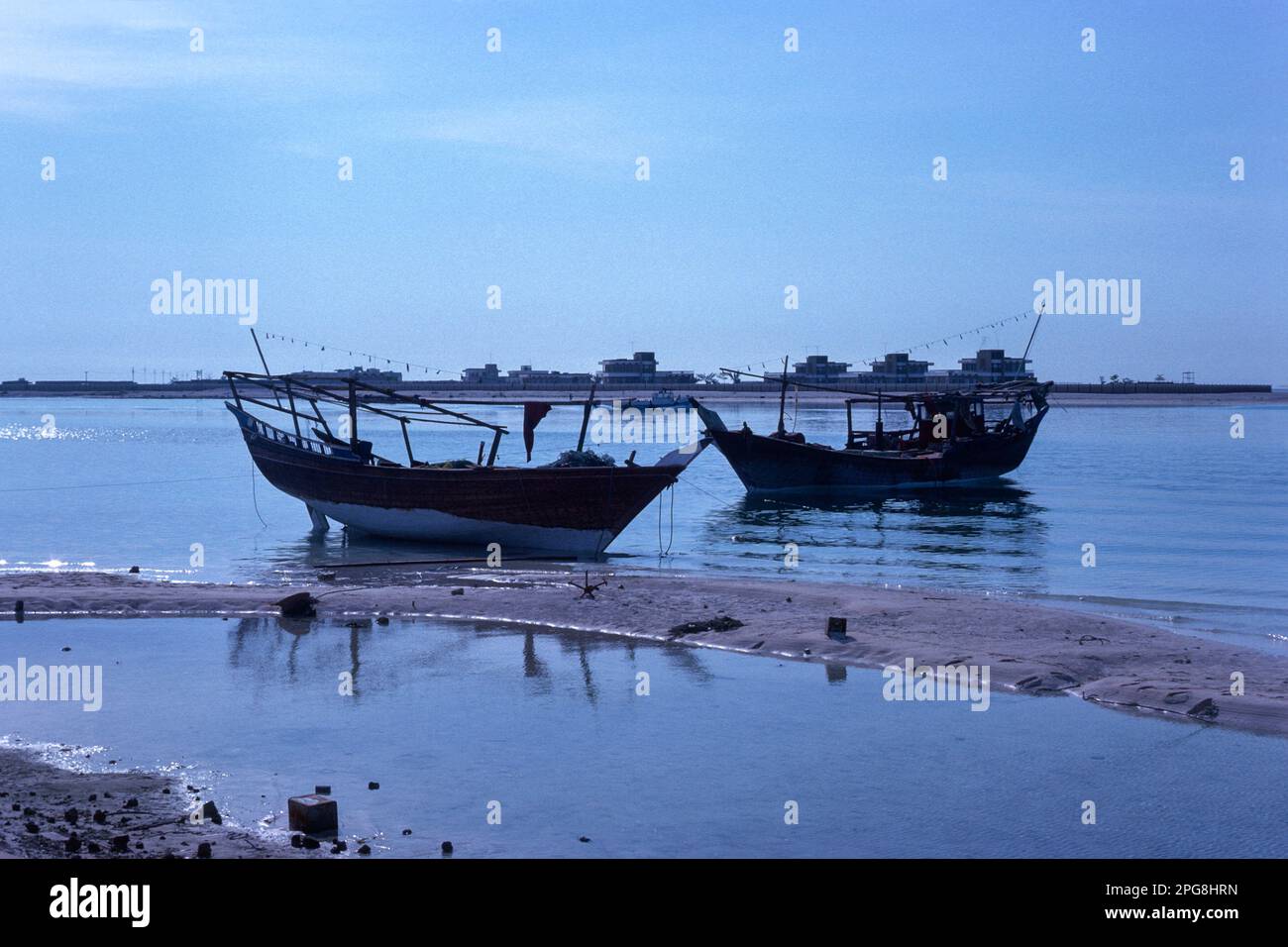 Abu Dhabi UAE 1976 – dhows moored at Al Bateen harbour (this area has now been redeveloped) in Abu Dhabi, United Arab Emirates Stock Photo