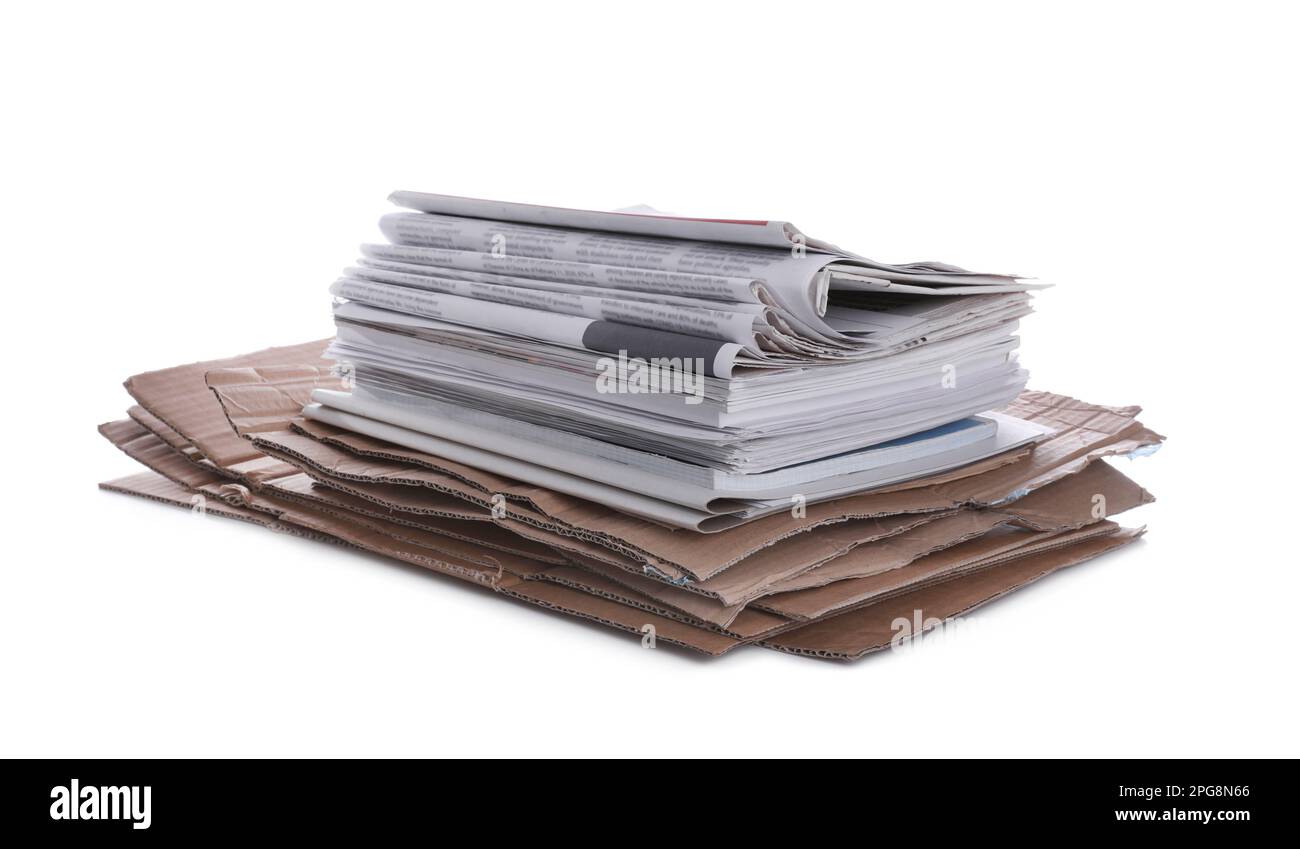 Stack of cardboard and newspapers on white background. Recycling