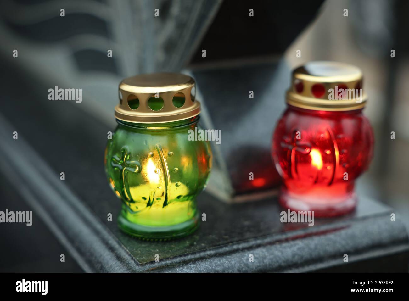 Grave lights on granite tombstone at cemetery, closeup Stock Photo Alamy