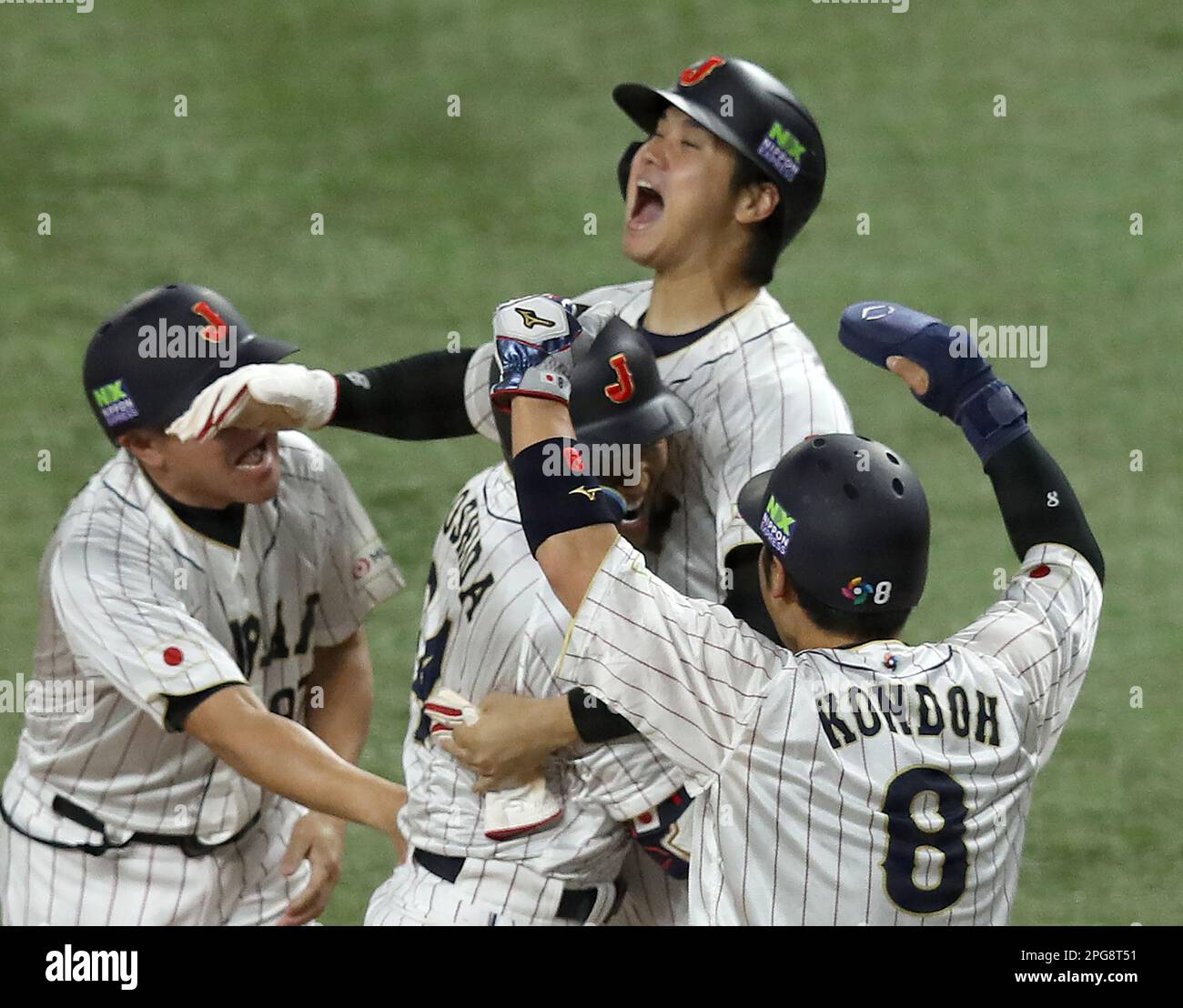 Miami, United States. 20th Mar, 2023. Japan's Masataka Yoshinda (34) celebrates with teammates after hitting a three run home run in the seventh inning of the 2023 World Baseball Classic semifinal game against Mexico in Miami, Florida on Monday, March 20, 2023. Photo by Aaron Josefczyk/UPI Credit: UPI/Alamy Live News Stock Photo